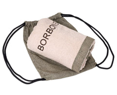 Telo mare Borbonese Mykonos con sacca porta telo. Telo mare tinta unita in spugna di puro cotone, discreto e raffinato, bordato e con logo ricamato. Colore ecrù beige