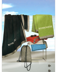 Telo mare Borbonese Mykonos con sacca porta telo. Telo mare tinta unita in spugna di puro cotone, discreto e raffinato, bordato e con logo ricamato.