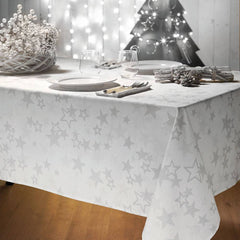 Tovaglia Natale Gabel Etoile  per 8, 12 o 18 persone. Fondo bianco con stelle grigie argento. Misto cotone e poliestere