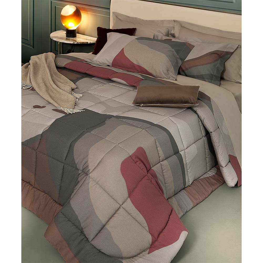 Trapunta invernale matrimoniale Borbonese Avant Garde in raso di puro cotone. Il piumone Borbonese Avant Garde presenta una fantasia moderna e caratterizzata da curve e forme morbide di vari colori, che intersecandosi donano alla trapunta movimento e dinamicità.