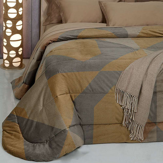 Trapunta invernale Borbonese Palace in velluto per letto matrimoniale. Il piumone Palace è caratterizzato da una fantasia moderna, con forme geometriche di vari colori e la tipica stampa Borbonese a occhio di pernice.