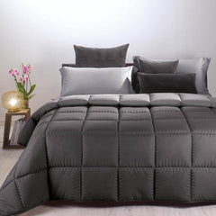 Trapunta invernale Caleffi Tinta Unita Double in microfibra. Piumone double face colore antracite grigio