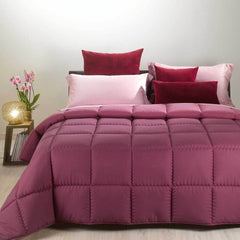Trapunta invernale Caleffi Tinta Unita Double in microfibra. Piumone double face colore vino bordeaux