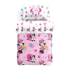 Trapunta invernale Caleffi Disney Minnie Allegra in puro cotone. Disponibile nella misura per letto singolo e piazza e mezza. Fantasia fondo rosa con pois colorati e Minnie. Ideale per la tua bambina.