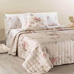 Trapuntino matrimoniale Caleffi Emotions in raso di puro cotone con stampa digitale di alta qualità. Fantasia floreale su fondo beige. Trapunta peso primaverile o autunnale