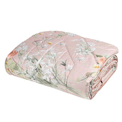 Trapuntino matrimoniale Fazzini Lilia in raso di puro cotone. Trapunta primaverile con fantasia floreale su fondo rosa. Quilt trapunta primaverile con fiori bianchi e colorati.