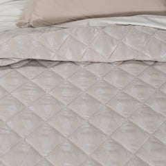Trapuntino matrimoniale Caleffi Nuit in raso jacquard. Trapunta primaverile con Fantasia moderna a rombi colore sabbia beige