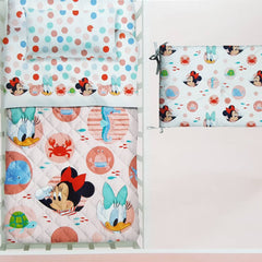 Set culla comprensivo di completo lenzuola, trapunta primaverile e paracolpi in cotone Caleffi Disney. Fantasia Baby Minnie, con Minnie e Paperina su fondo rosa.
