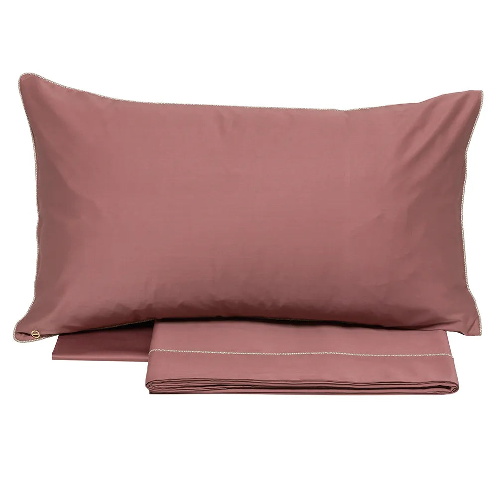 completo lenzuola borbonese lounge tinta unita blush bordeaux con bordino fantasia occhio di pernice a contrasto