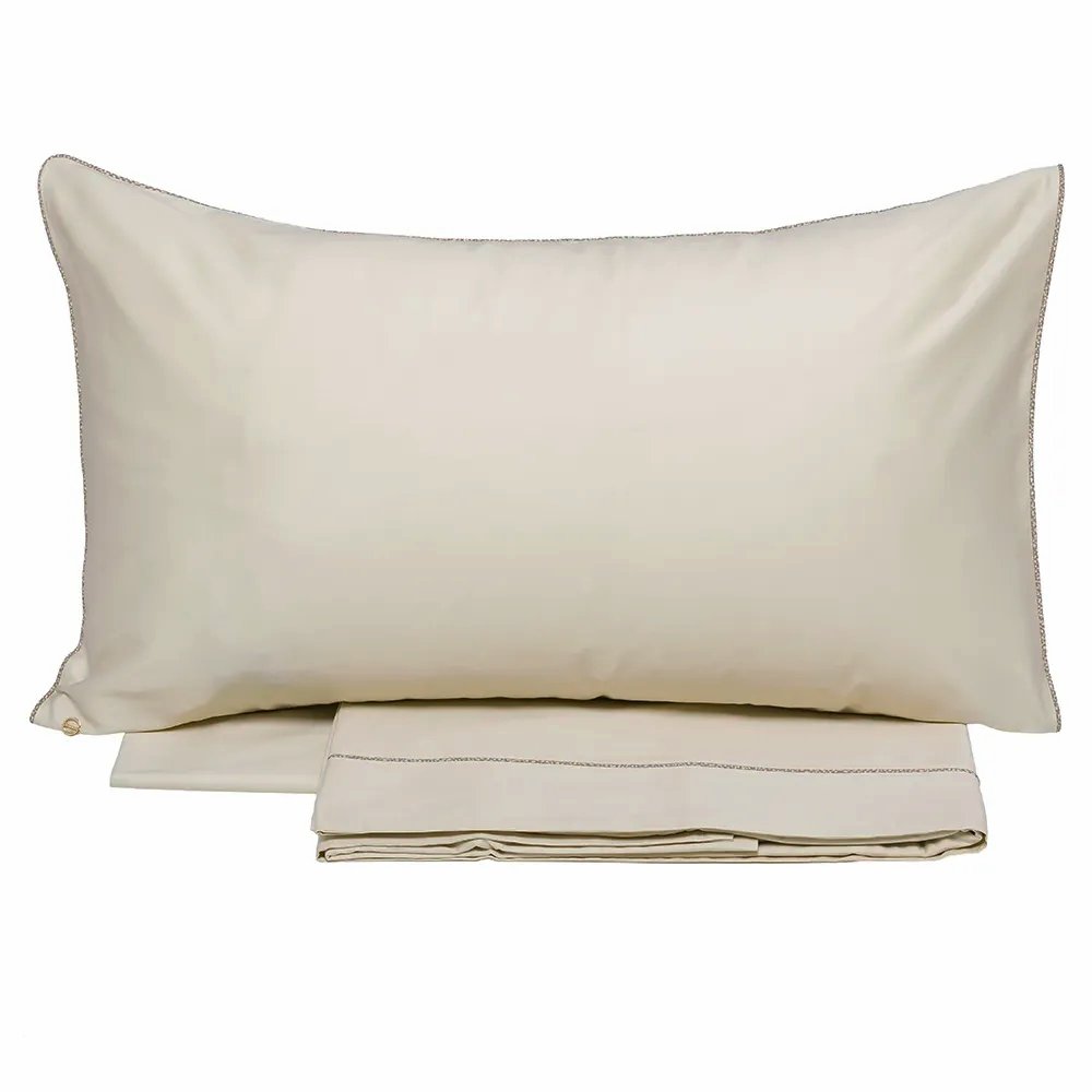 completo lenzuola borbonese lounge tinta unita sabbia beige con bordino fantasia occhio di pernice a contrasto