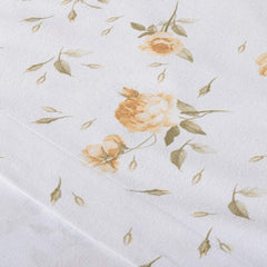 lenzuola Caleffi Rosa in flanella di cotone fantasia con fiori biscotto ocra su fondo bianco.