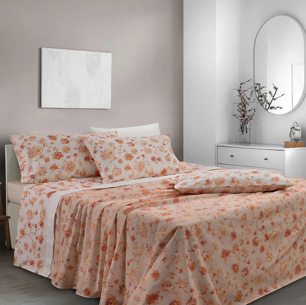 Lenzuolo copriletto Graciosa Gabel. Fantasia con fiori arancio su fondo pesca.