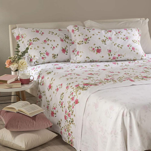 Completo lenzuola Caleffi Roseto in flanella di puro cotone, misura matrimoniale maxi. Le lenzuola in flanella Roseto presentano una delicata fantasia floreale con fiori corallo su fondo chiaro.