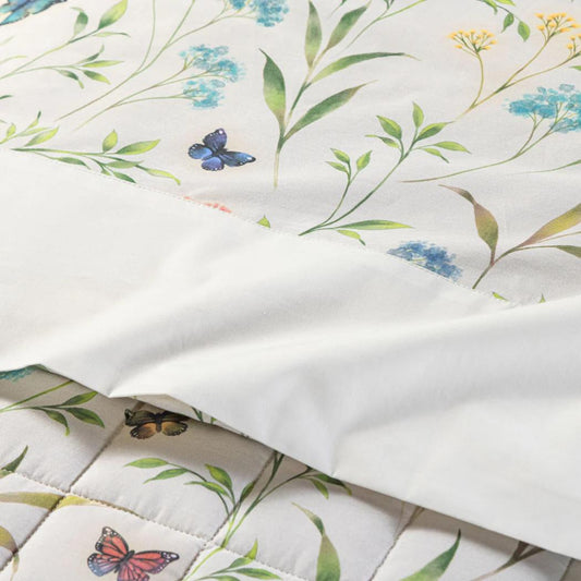 lenzuolo matrimoniale Caleffi Armonie fantasia fiori e farfalle fondo avorio