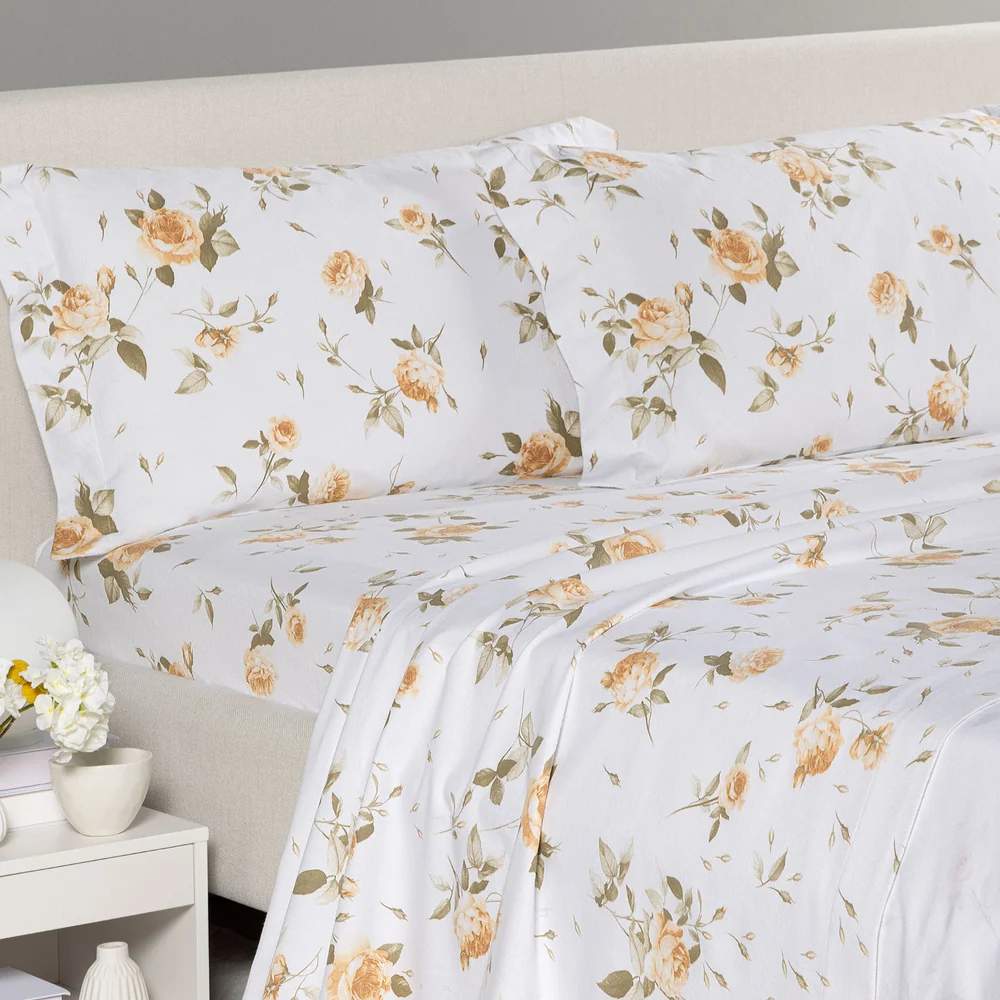 lenzuola Caleffi Rosa in flanella di cotone fantasia floreale biscotto con fiori ocra su fondo bianco.