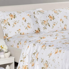 lenzuola Caleffi Rosa in flanella di cotone fantasia floreale biscotto con fiori ocra su fondo bianco.