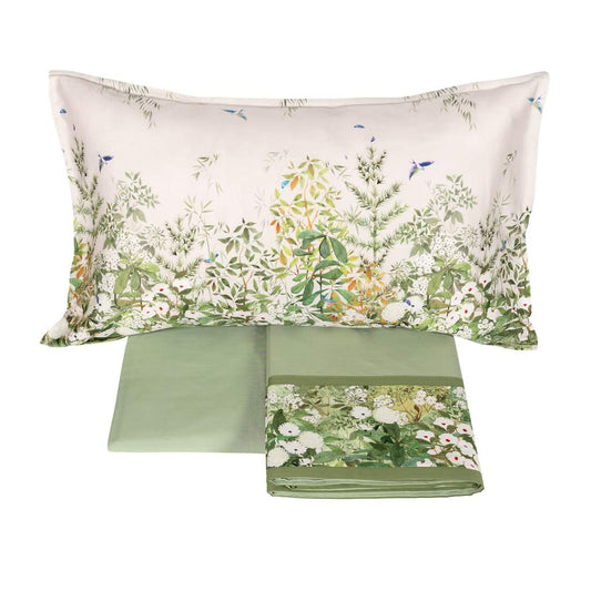 completo lenzuola nara fazzini. Federe fantasia floreale su fondo chiaro. Resto del completo tinta unita verde.