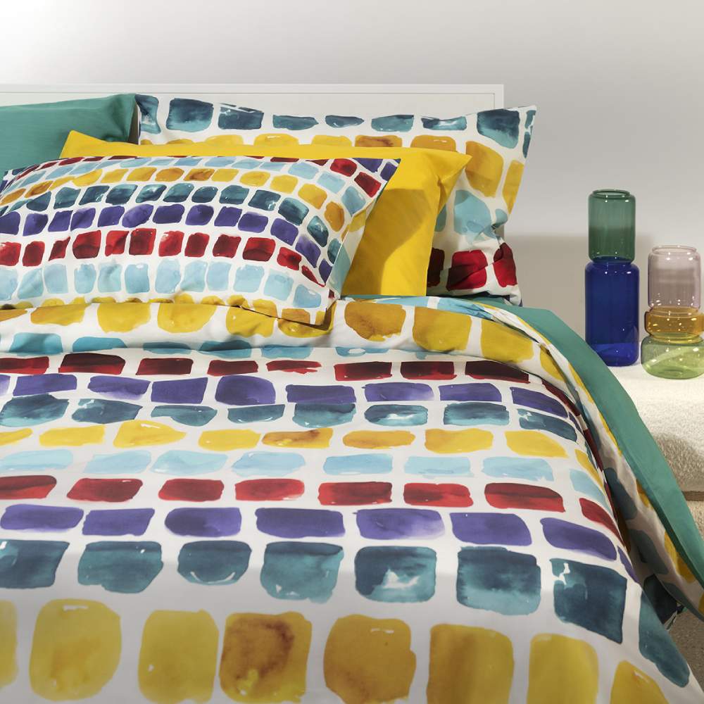 Copripiumino Palette Fazzini. Fantasia geometrica a quadrettoni con colori vivaci (giallo, rosso, blu)
