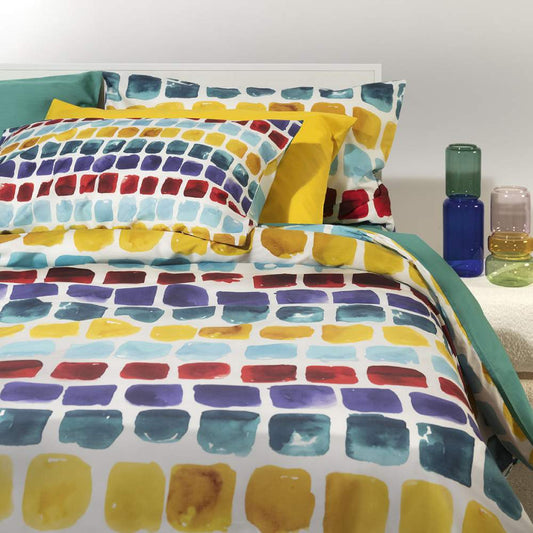 Copripiumino Palette Fazzini. Fantasia geometrica a quadrettoni con colori vivaci (giallo, rosso, blu)