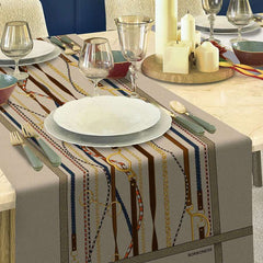 Runner Borbonese iconic pegaso. Corsia cotone fantasia occhio di perrnice con cinghie e catene marroni, oro e blu.