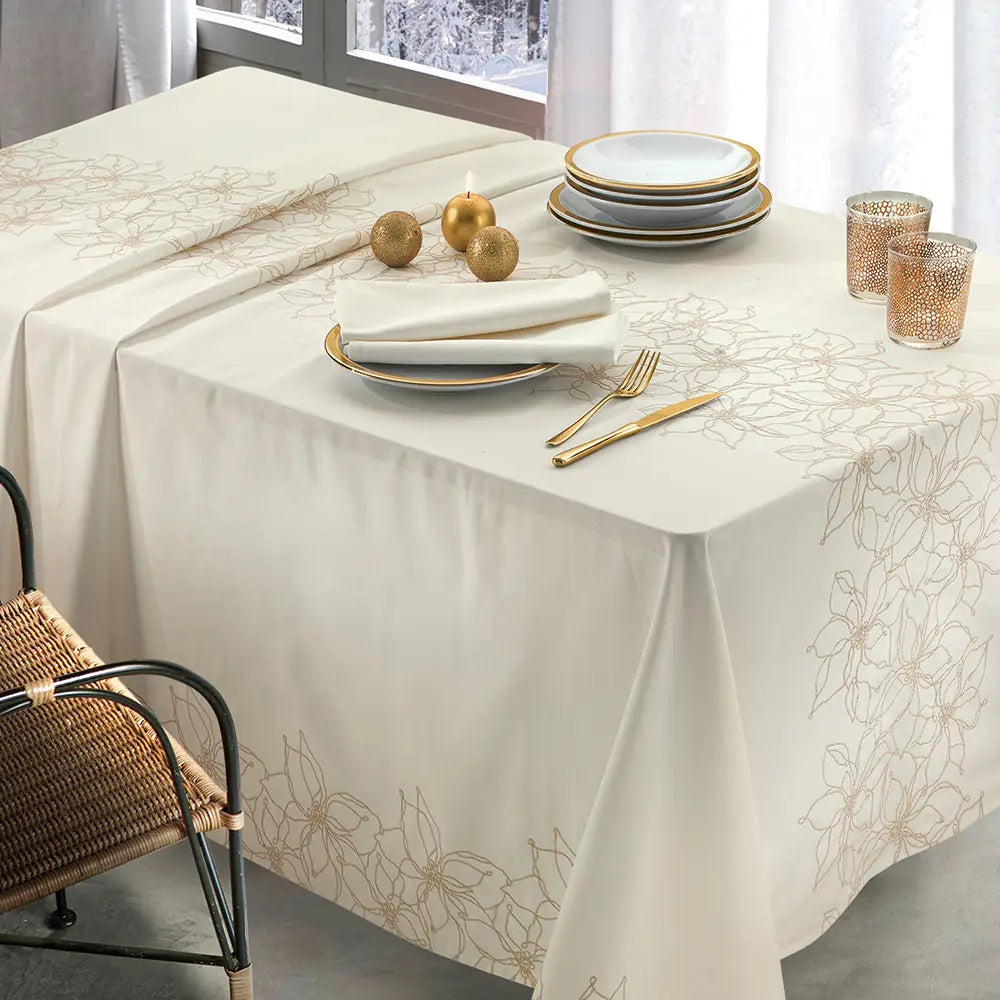 Servizio tavola natalizio Flora di Gabel  Fantasia natalizia floreale color oro su fondo avorio. Tovaglia con tovaglioli.