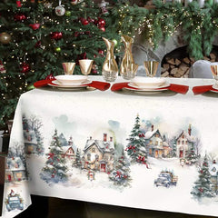 Tovaglia natalizia Frozen di Tessitura Randi in cotone. Fantasia su fondo avorio. Paesaggio con abeti e case innevate. 