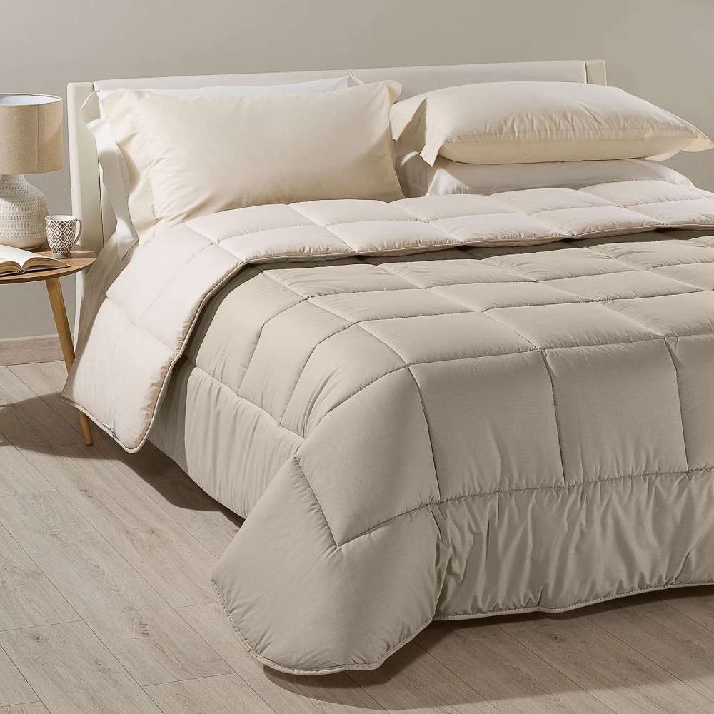 Trapunta invernale matrimoniale Bicolor di Caleffi, in puro cotone tinta unita doubleface. Piumone colore naturale tortora