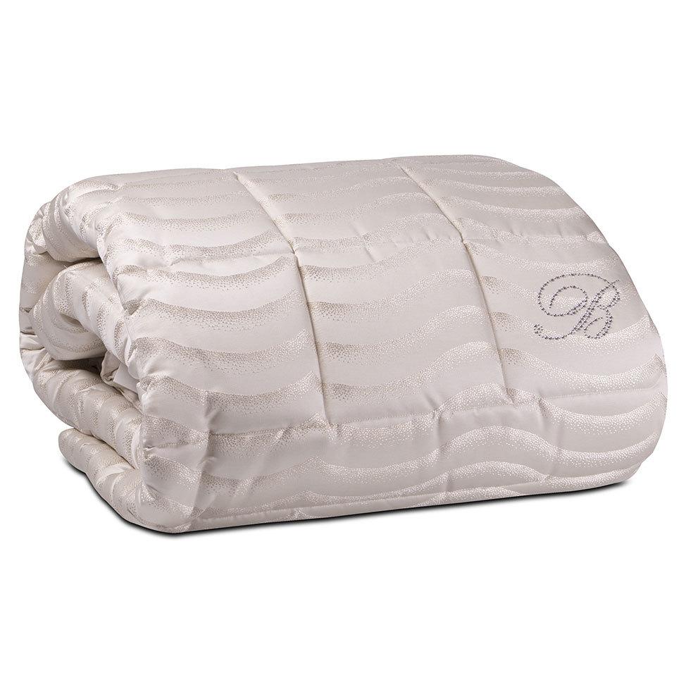 Trapunta Invernale matrimoniale Jasmine di Blumarine, in raso jacquard. piumone in fantasia con motivo a onde. Colore ecrù avorio