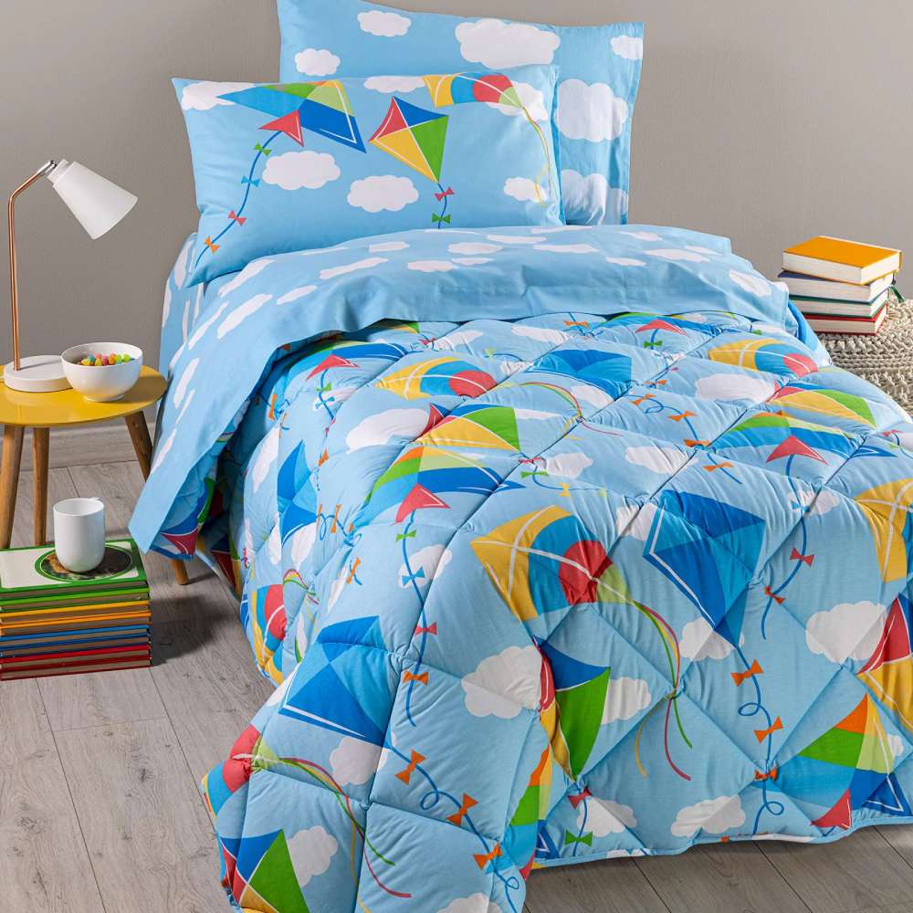 Trapunta invernale Caleffi Aquiloni in cotone. Piumone fantasia con aquiloni su fondo azzurro. Per letto singolo e piazza e mezza.