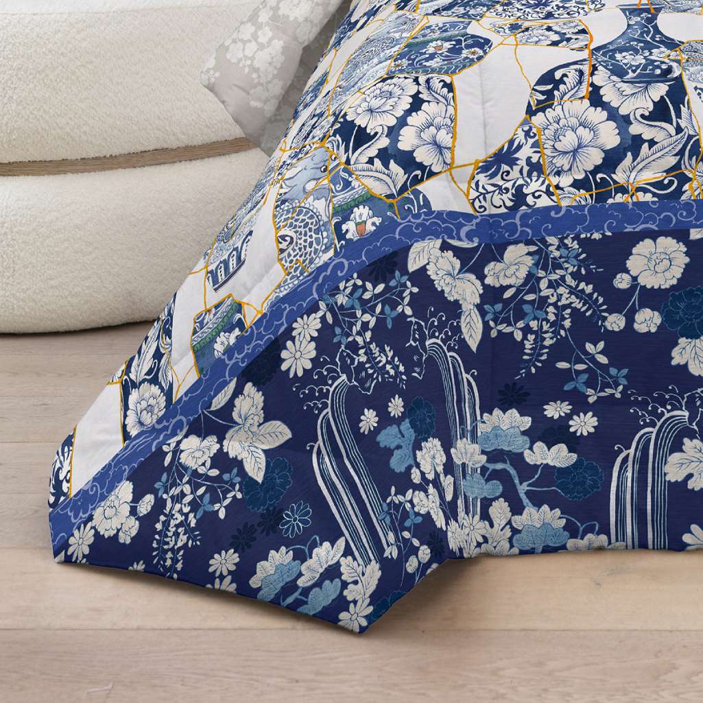 trapunta invernale kintsugi fazzini fantasia moderna bianca e blu con dettagli oro