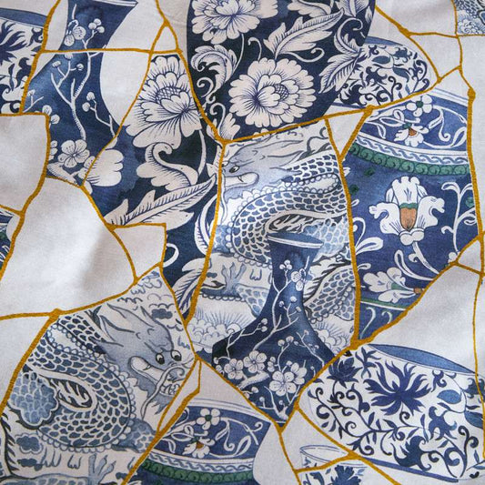trapunta invernale kintsugi fazzini fantasia moderna bianca e blu con dettagli oro