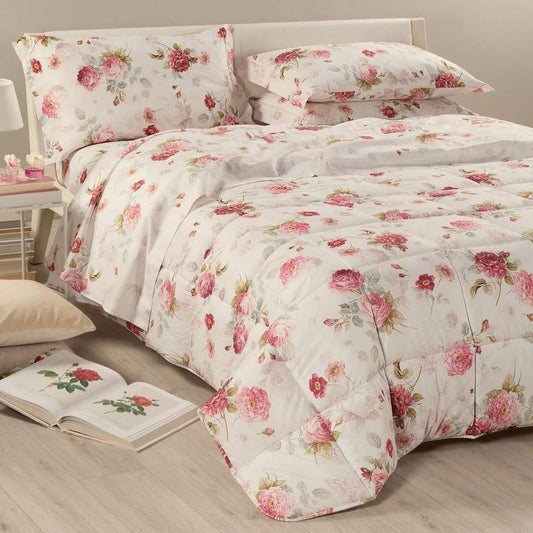 Trapunta invernale matrimoniale Caleffi Eden Rose, in puro cotone con stampa digitale. il piumone Eden Rose presenta una delicata fantasia floreale, con rose rosse su su fondo avorio.