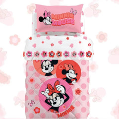 Trapunta invernale Caleffi Disney Minnie Flowers in cotone. fantasia con  Minnie su fondo rosa.