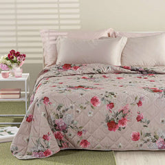 Trapunta primaverile Caleffi Melody in microfibra, per letto matrimoniale. Trapuntino con romantica fantasia floreale con rose rosse e fiori chiari su fondo tortora