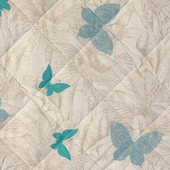 Trapuntino Marisol Caleffi fantasia botanica beige con farfalle azzurre. dettaglio