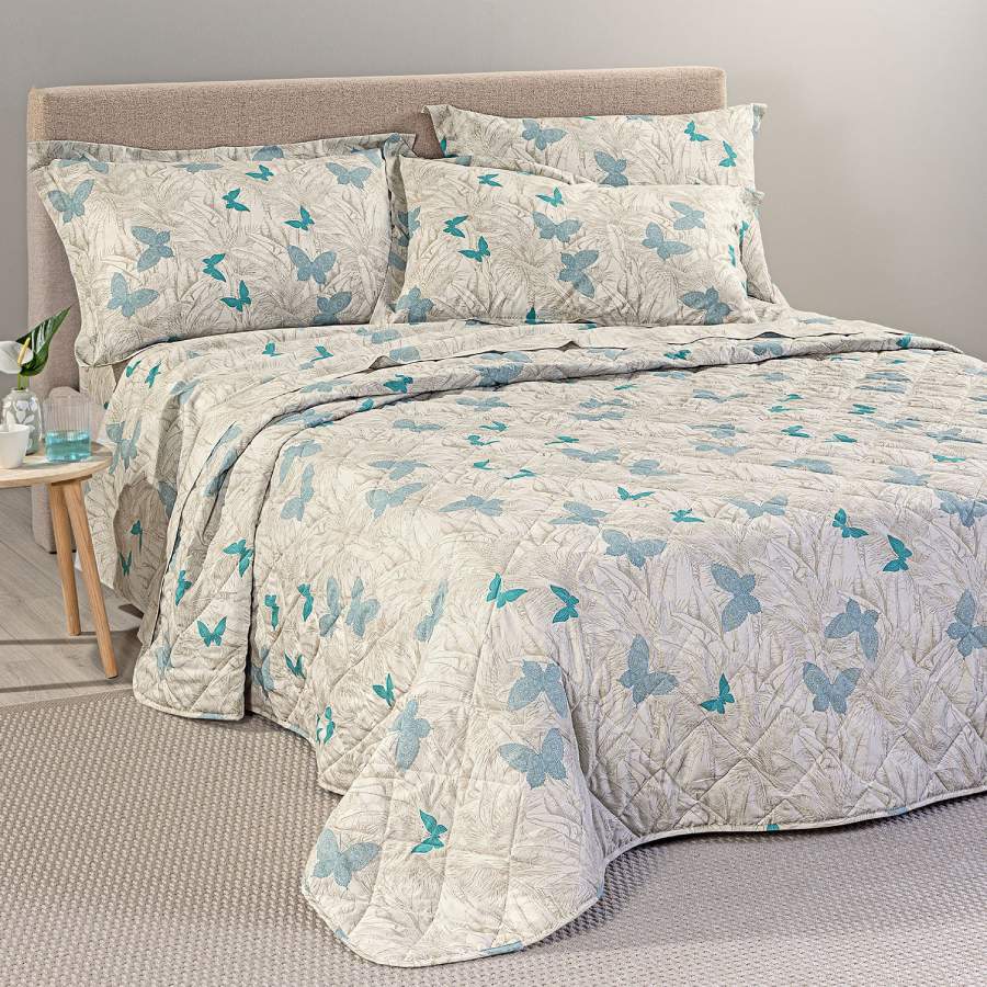 Trapuntino Marisol Caleffi fantasia botanica beige con farfalle azzurre