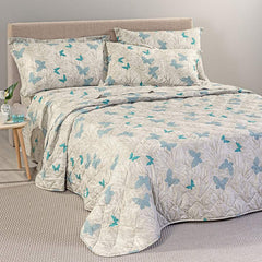 Trapuntino Marisol Caleffi fantasia botanica beige con farfalle azzurre