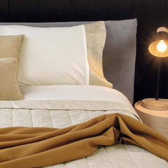 completo lenzuola in flanella fazzini Galuchat per letto matrimoniale. Tinta unita con bordi fantasia. Colore beige.