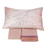 Completo lenzuola matrimoniale Fazzini Panta Rei in percalle e raso di puro cotone. Fantasia floreale rosa.