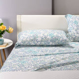 Lenzuola Caleffi Milk completo in cotone con fantasia a fiori azzurro per letto matrimoniale e singolo