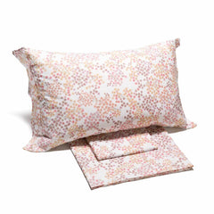 Lenzuola Caleffi Milk completo in cotone con fantasia a fiori corallo per letto matrimoniale e singolo