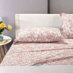 Lenzuola Caleffi Milk completo in cotone con fantasia a fiori corallo per letto matrimoniale e singolo