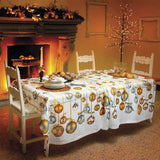 Tovaglia natale Golden jingle di Tessitura Toscana Telerie. In puro lino. Fantasia con sfere dorate e argentate su fondo bianco. Misura per 12 persone 170x270 cm