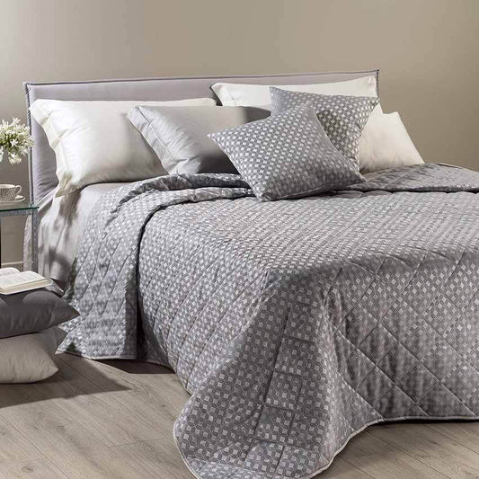 Trapuntino matrimoniale Rich Caleffi in raso jacquard. Fantasia geometrica colore grigio. Copriletto trapuntato, trapunta primaverile.