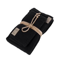Asciugamano con ospite Coccola Fazzini. Coppia asciugamani in tinta unita. Colore nero. Spugna di cotone 550 g/mq.