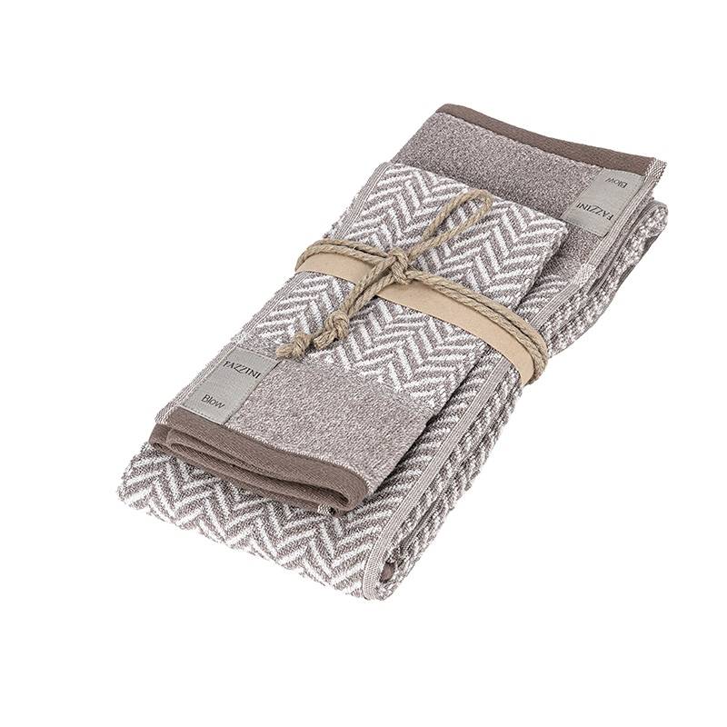 Coppia asciugamani Fazzini Chevron, in spugna di puro cotone tinta in filo. Asciugamani con fantasia a righe colore naturale beige