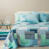 Coperta estiva Formentera Caleffi in piquet di puro cotone. Copriletto non trapuntato, fantasia geometrica moderna, colore blu oceano. Misura letto singolo, piazza e mezza e matrimoniale