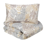 Copripiumino matrimoniae Textures di Fazzini. Fantasia primaverile con foglie naturale sasso beige. Raso di cotone.