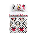 Trapunta invernale Minnie Pois in cotone, linea Caleffi Disney. Disponibile nella misura per letto singolo.  Fantasia molto originale con Minnie su fondo bianco con pois neri.