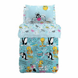Trapunta invernale Silvestro & Titti, della linea Looney Toons di Caleffi. Trapunta in puro cotone nella misura letto singolo, per bambino e bambina. Fondo azzurro verde acqua